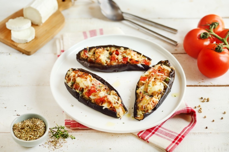 Stuffed eggplants with goat cheese, caramelized onions, honey, tomatoes and thyme