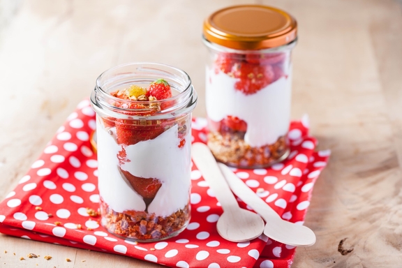 Granola and goat fromage frais with strawberries