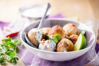 Indian-style chicken meatballs with a goat cheese sauce