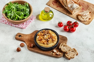 Oven-baked goat cheese with a crumble-style topping